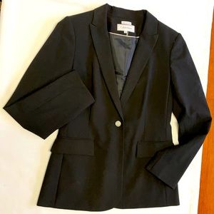 Black blazer worn once for an interview. This will never go out of style.